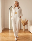Aria | Dames Jumpsuit met Korte Mouwen en Wijde Pijpen — front view