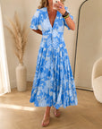 Minelda - Elegante Bloemen V-hals Jurk met Zakken — Blauw