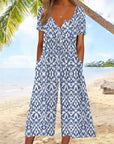 Lagoon | Dames Bladprint V-Hals Korte Mouw Wijde Pijpen Jumpsuit