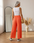 Luchtige Plissé Broek - Neon Koraal - Zomerse Reisbroek — back view