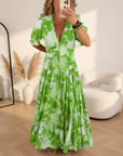 Minelda - Elegante Bloemen V-hals Jurk met Zakken